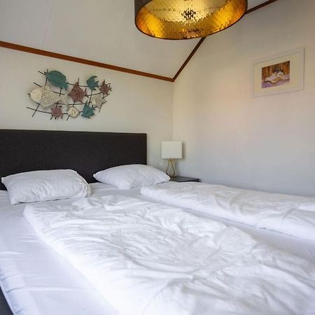 Mosselbank 83 Comfortable Holiday Residence Ouddorp Bagian luar foto