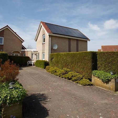 Mosselbank 83 Comfortable Holiday Residence Ouddorp Bagian luar foto