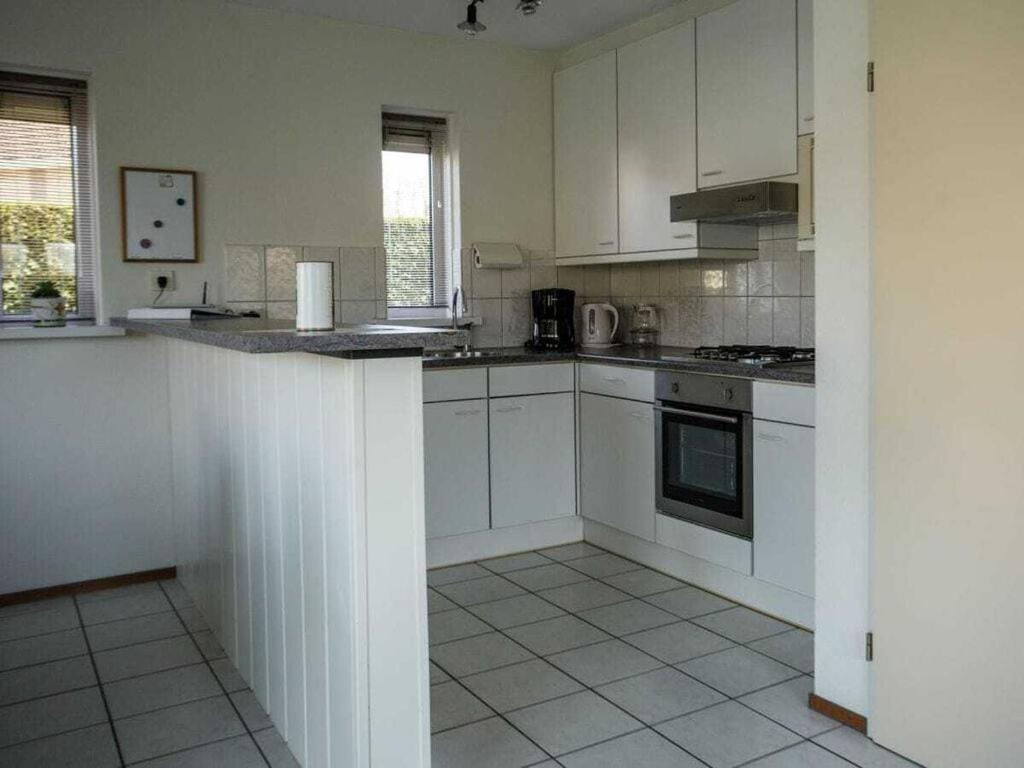 Mosselbank 83 Comfortable Holiday Residence Ouddorp Bagian luar foto