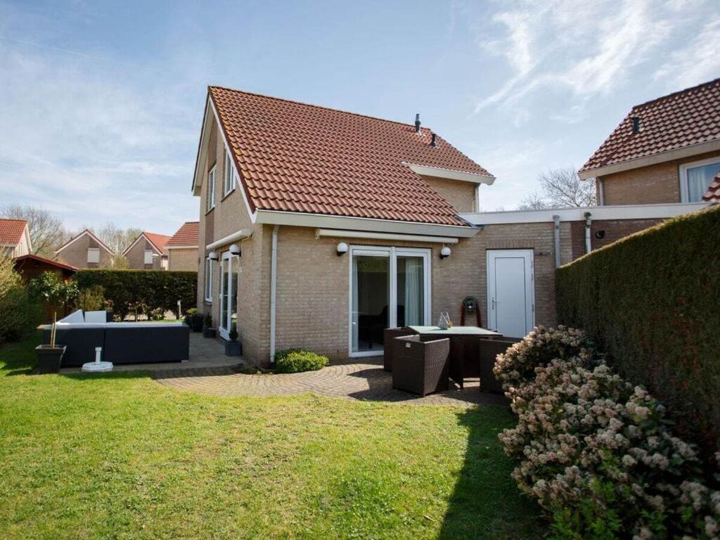 Mosselbank 83 Comfortable Holiday Residence Ouddorp Bagian luar foto