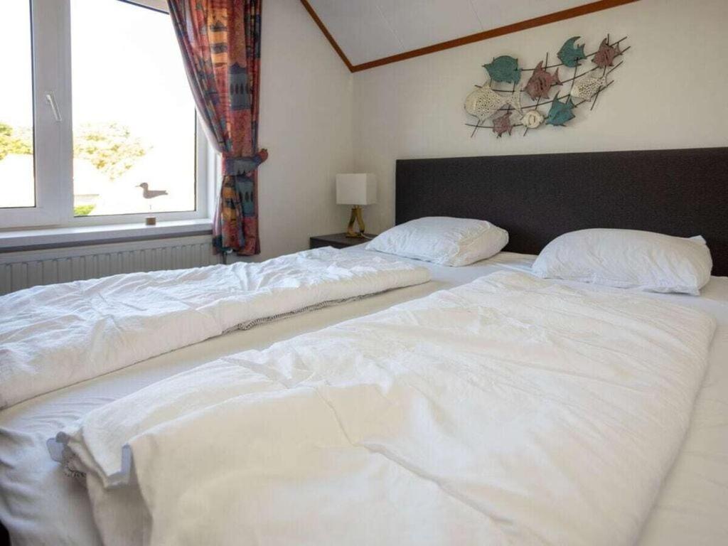 Mosselbank 83 Comfortable Holiday Residence Ouddorp Bagian luar foto