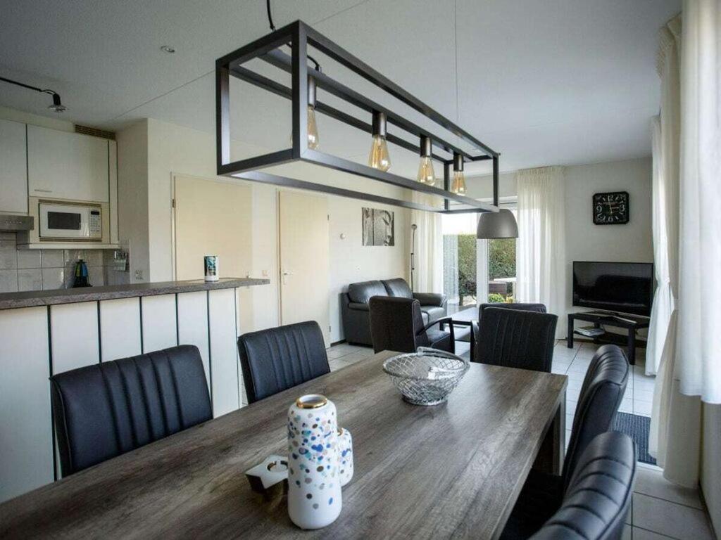 Mosselbank 83 Comfortable Holiday Residence Ouddorp Bagian luar foto