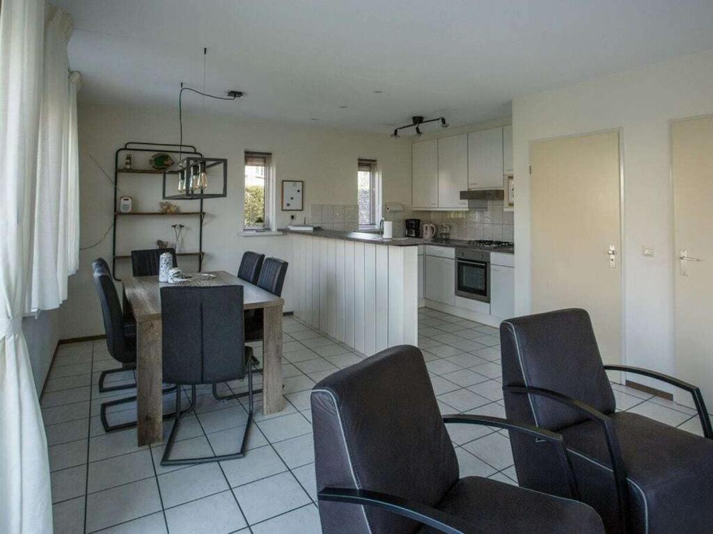 Mosselbank 83 Comfortable Holiday Residence Ouddorp Bagian luar foto