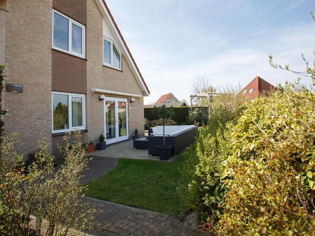 Mosselbank 83 Comfortable Holiday Residence Ouddorp Bagian luar foto
