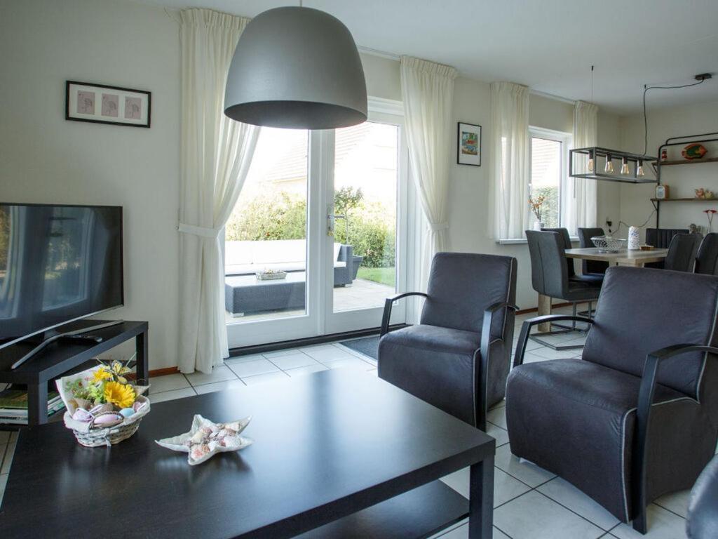 Mosselbank 83 Comfortable Holiday Residence Ouddorp Bagian luar foto